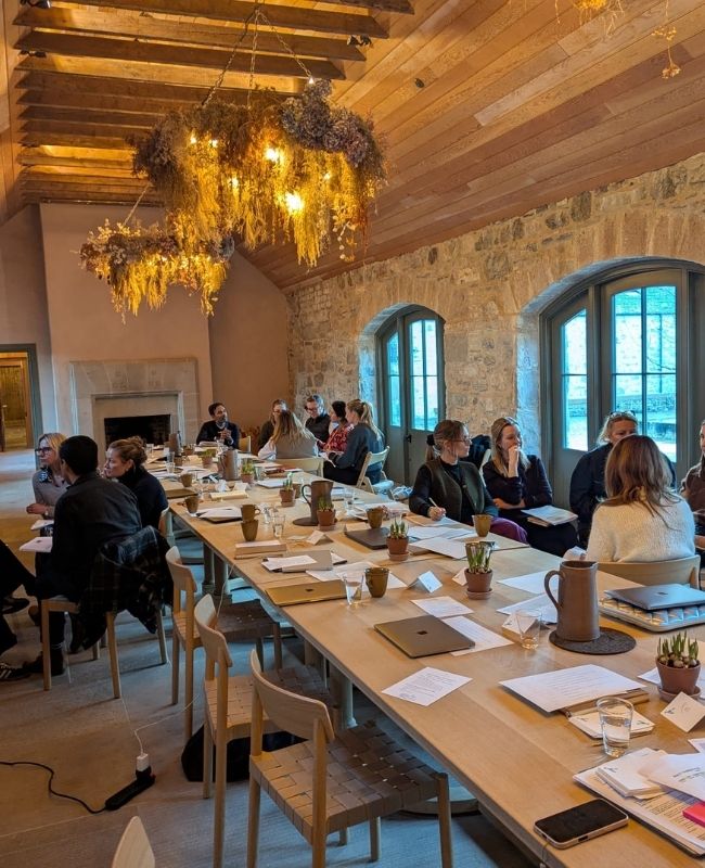 A leadership team working together around the table